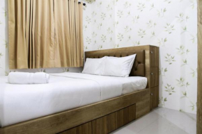Well Designed 2BR Green Pramuka City Apartment By Travelio